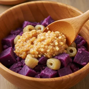 Mixing purple sweet potato filling with fermented garlic paste